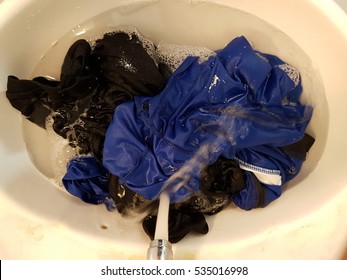 Clothes Washing In The Sink