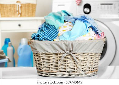 Clothes In Wicker Basket At Laundry