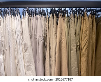 A Lot Of Clothes,khaki, Pants Hanging Are Sold On The Shop