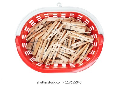 Clothespins In Red Basket. View From Above. Closeup.