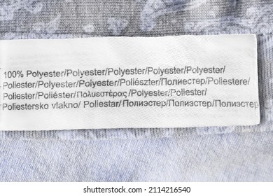 Clothing Label Says 100% Polyester In Various Languages Closeup