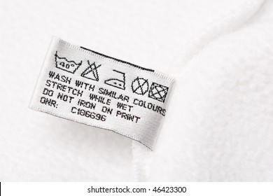 Clothing Label Washing Instruction Tag On White T-shirt