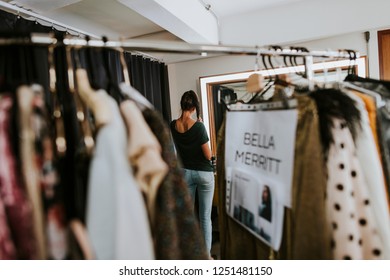 Clothing Rack With Selected Outfits