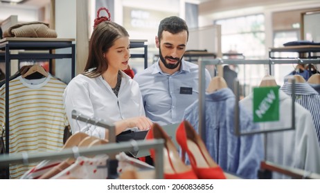 Clothing Store: Visual Merchandiser Talks To Sales Associate, Explains Strategy, Collection Visualization, Optimization Of Customer Experience. Fashion Shop With Stylish, Trendy, Sustainable Brands