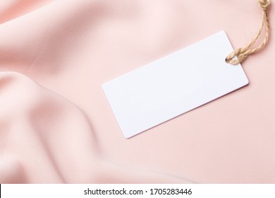 Clothing Tag, Label Blank Mockup On A Clothes, To Place Your Design.  Fashion, People And Shopping Concept - Close Up Price Tag Of Clothing Item