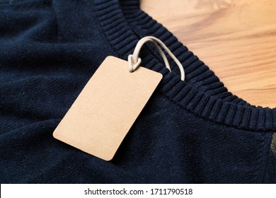 Clothing Tag, Label Blank Mockup On A Clothes, To Place Your Design.  Fashion, People And Shopping Concept - Close Up Price Tag Of Clothing Item
