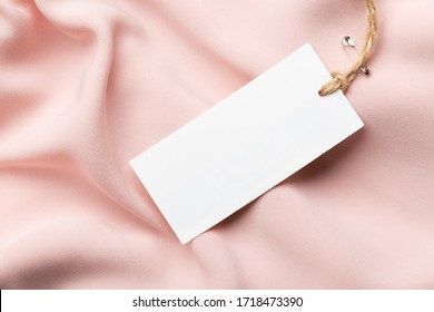 Clothing Tag, Label Blank Mockup On A Clothes, To Place Your Design.  Fashion, People And Shopping Concept - Close Up Price Tag Of Clothing Item