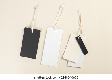 Clothing Tag, Label Blank Mockup Template On A Beige Background Place For Text Or Your Logo