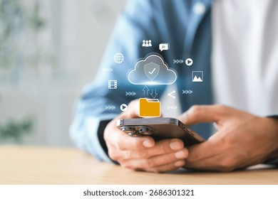 Cloud based file storage with advanced security , Man working with mobile phone showing cloud computing diagram and application software in hand cloud technology