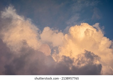  cloud and blue sky 
evening sky with clouds obscuring the sun - Shutterstock ID 2138957765