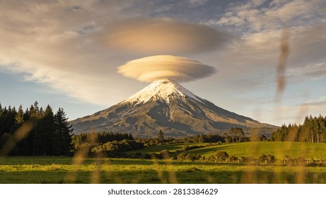 Cloud Cap Drapes Over Symmetrical Summit