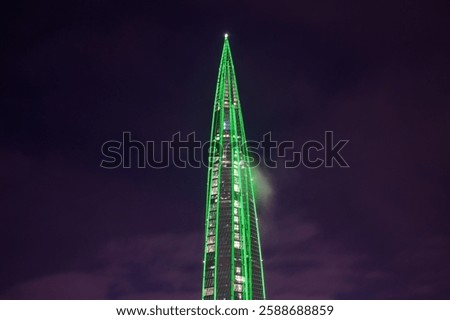 A cloud caught on a skyscraper. the Lakhta Center building turned into a New Year tree. St. Petersburg, Russia.