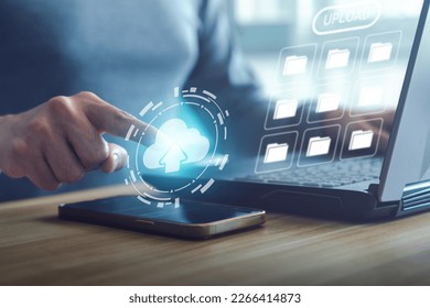 Cloud comouting technology concept. People using cloud software on smartphone  and laptop computer for back up data.