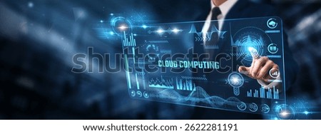 Cloud Computing: Businessman analyzing digital screen of graph data and data storage, scalability, virtualization, remote access, and security management.