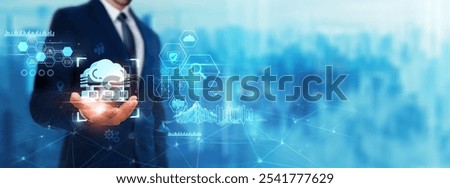 Cloud Computing: Businessman holding cloud icon. Digital technology era of future. Scalable technology of deep learning, data storage, computing power, collaboration concept.