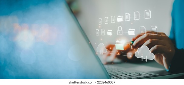 Cloud computing concept. Businessman using computer to backup storage data Internet technology. backup online documentation database and digital file storage system or software, file access. Cloud..