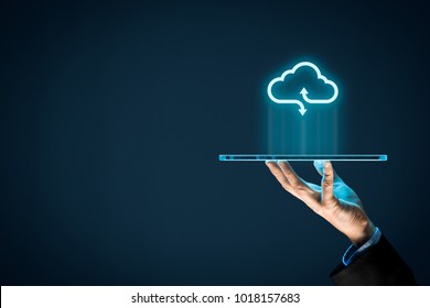 Cloud computing concept - connect devices to cloud. Businessman or information technologist with cloud computing icon and tablet. - Shutterstock ID 1018157683