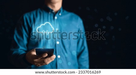 Cloud computing concept connect devices to cloud. Businessman or information technologist with cloud computing icon and smartphone