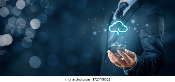 Cloud Computing Concept - Connect Smart Phone To Cloud. Businessman Or Information Technologist With Cloud Computing Icon And Smart Phone.