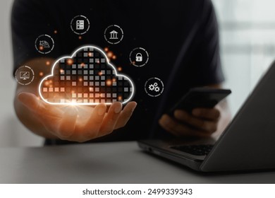 Cloud computing concept, Man hand holding cloud icon on the virtual display, Backup Storage Data Internet, networking and digital protection, Share global, Cyber Security, Business technology concept.