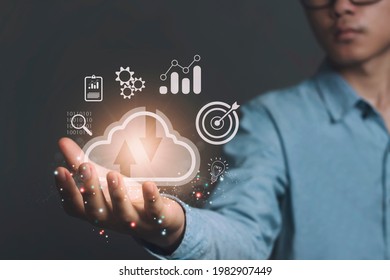 Cloud computing concept. Young Asian Businessman with Cloud Technology Storage Network or transfer data and a large database, big data Through internet technology.