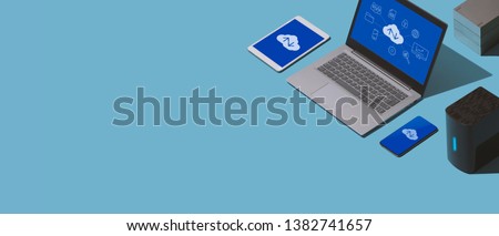 Cloud computing, data transmission, storage and backup concept: isometric computer, servers and hard disks, blank copy space