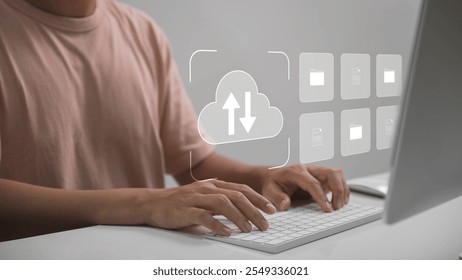 Cloud Computing with Digital File Management, Person typing on keyboard with cloud icons, symbolizing online file management, cloud computing, and digital data transfer.