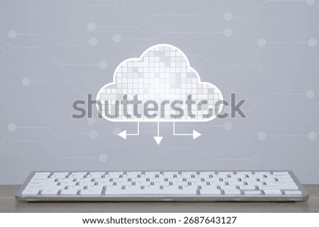 Cloud computing icon above keyboard represents data storage, cloud technology, digital transformation, and online connectivity perfect for illustrating IT infrastructure and modern tech solutions.