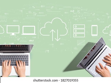 Cloud computing with people working together with laptop computers