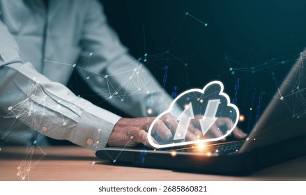 Cloud computing technology concept. Businessman using a laptop with digital cloud upload and download icons. Symbolizing data storage, file transfer and secure online network solutions.
