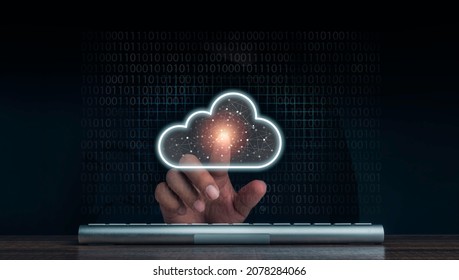 Cloud Computing Technology Concept. Cloud Icon Virtual Appeared While Man Pointing Finger And Keyboard Computer With Network And Coding On Dark Background. Network Data Storage Technology Service.