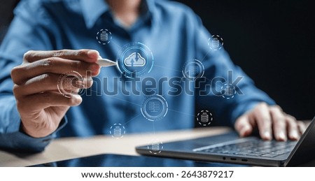 Cloud computing technology. Cloud database connect. Data server storage management. Data cloud concept. Network computer. A man is drawing a cloud on a laptop screen.