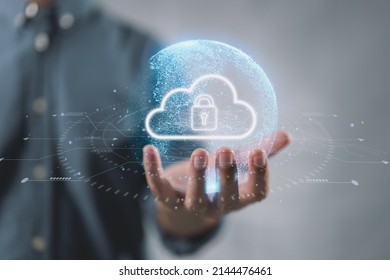 Cloud computing technology database storage security concept Backup transfer. There is a large cloud icon on the right in an abstract world on businessman. - Shutterstock ID 2144476461