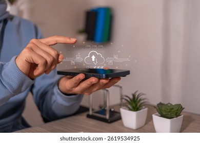 Cloud computing technology: Man managing secure data on virtual servers with a futuristic holographic interface from his smartphone