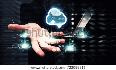 Cloud computing technology for network security in data center : Business man hold the cloud icon working with laptop