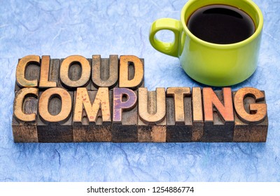 cloud computing - word abstract in vintage letterpress wood type with a cup of coffee