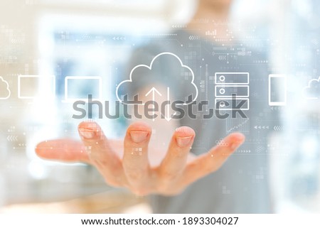 Cloud computing with young man holding his hand