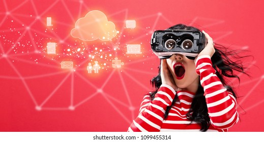 Cloud Computing with young woman using a virtual reality headset