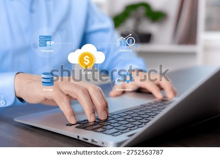 Cloud cost management concept with virtual interface icons showing compute, storage, analytics, and automation over a laptop keyboard. Ideal for themes of cloud budgeting, resource optimization, FinOps, IT spending control, infrastructure planning, digital efficiency, business analytics, and modern enterprise technology management.