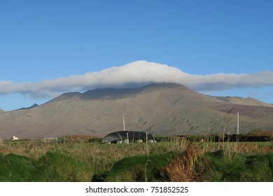 a cloud covered mountain