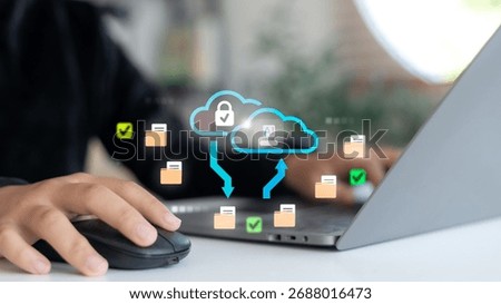 Cloud data storage and AI integration concept showing a person using a laptop with secure file transfer, cloud computing, data backup, and cybersecurity protection for business technology.