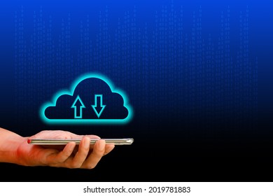 Cloud data storage concept. Hand hold cloud computing with transfer arrow with binary code and technology background. Communication of business and financial. 
