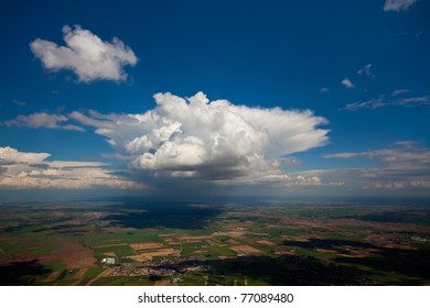 Cloud developing into a thunderstorm