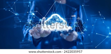 Cloud or edge computing technology concept. Businessman uses finger to click cloud icon connects data access Global use abstract binary code on dark blue background.