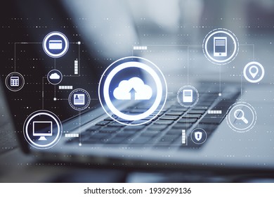 Cloud Exchange Service Concept With Digital Data Icons On Laptop Background. Double Exposure