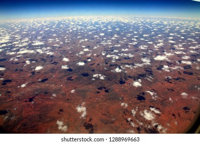 Cloud Flakes Above The Heat Of Australian Outback