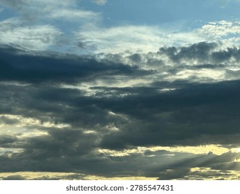 Cloud formations in the sky creating natural atmospheric weather background and open outdoor sky scene