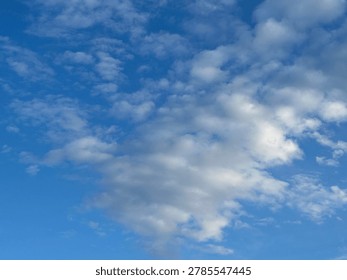 Cloud formations in the sky creating natural atmospheric weather background and open outdoor sky scene