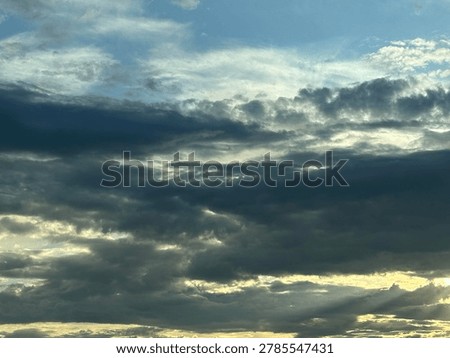Cloud formations in the sky creating natural atmospheric weather background and open outdoor sky scene