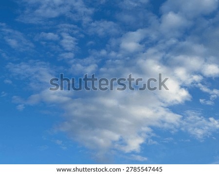 Cloud formations in the sky creating natural atmospheric weather background and open outdoor sky scene